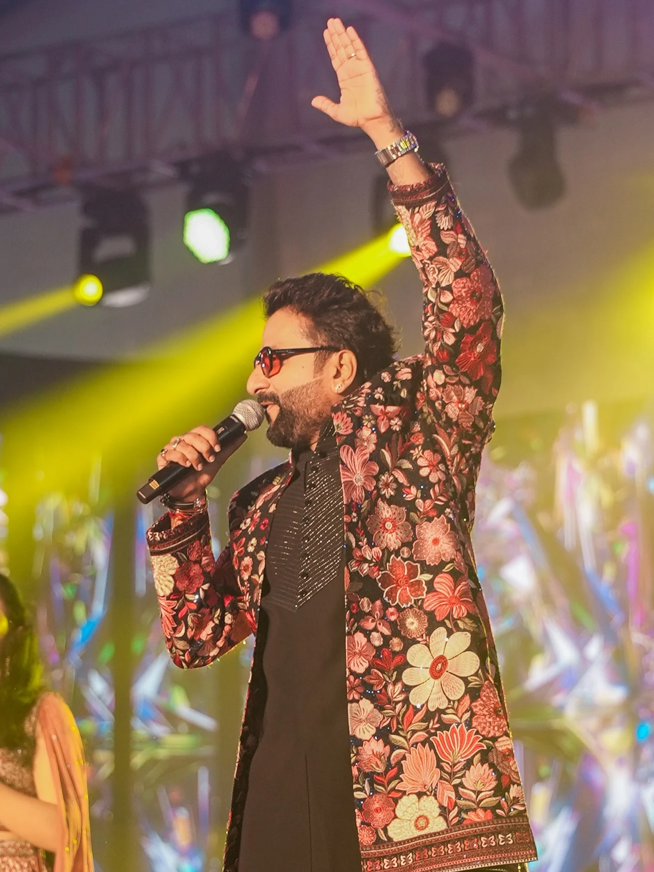 MJ Manish Joshi live singer holding a microphone